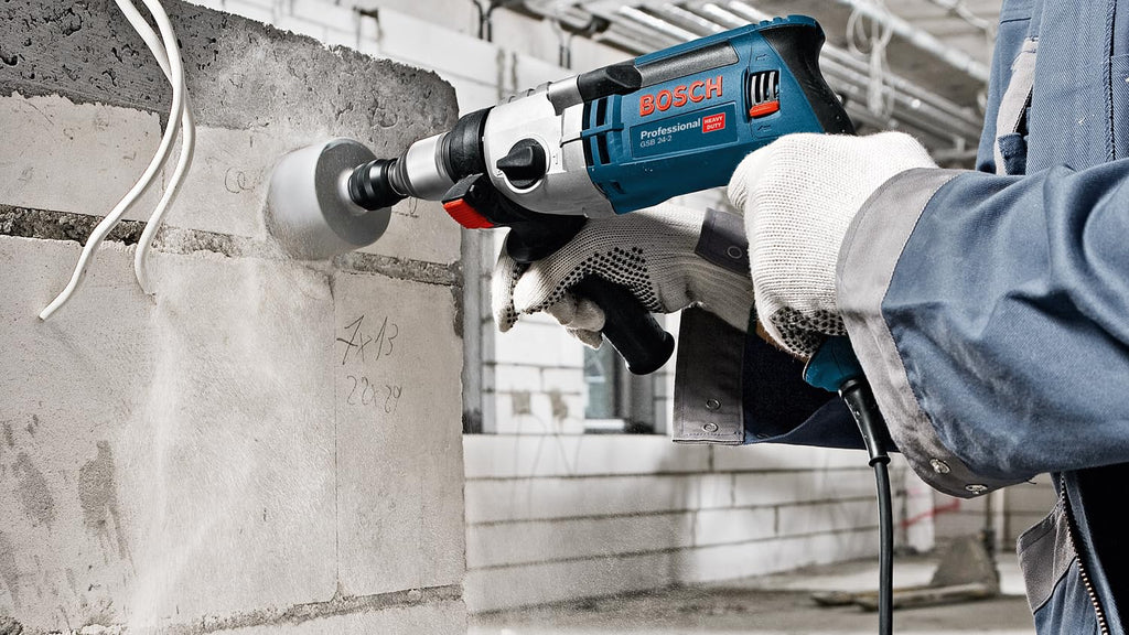 Bosch Professional Schlagbohrmaschine GSB 24-2 (Leistung 1100 Watt, Max. Drehmoment: 40/14,5 Nm, inkl. Schnellspannbohrfutter, Zusatzhandgriff, Tiefenanschlag, L-Case)