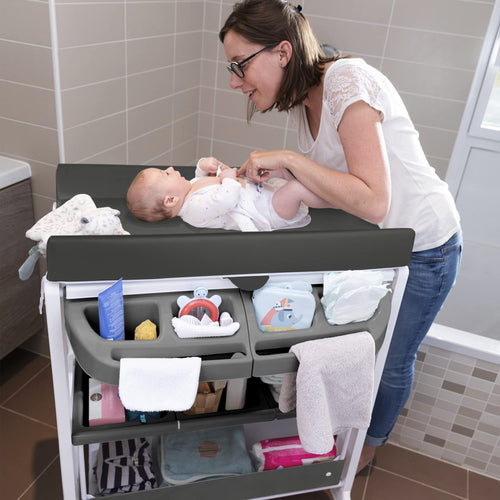 Bebeconfort Dolphy, 2-in-1 Baby Badewanne & Wickelkommode, 0 –12 Monate (max. 11 kg), Einfach Bewegbar Dank 4 Rollen, Aufbewahrungsfächer, Gepolsterte Wickelauflage, Einfache Wannenleerung, Grey Mist