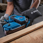 Bosch Professional Bandschleifer GBS 750 (850-W-Motor, inkl. Textilschleifband, Staubbeutel)