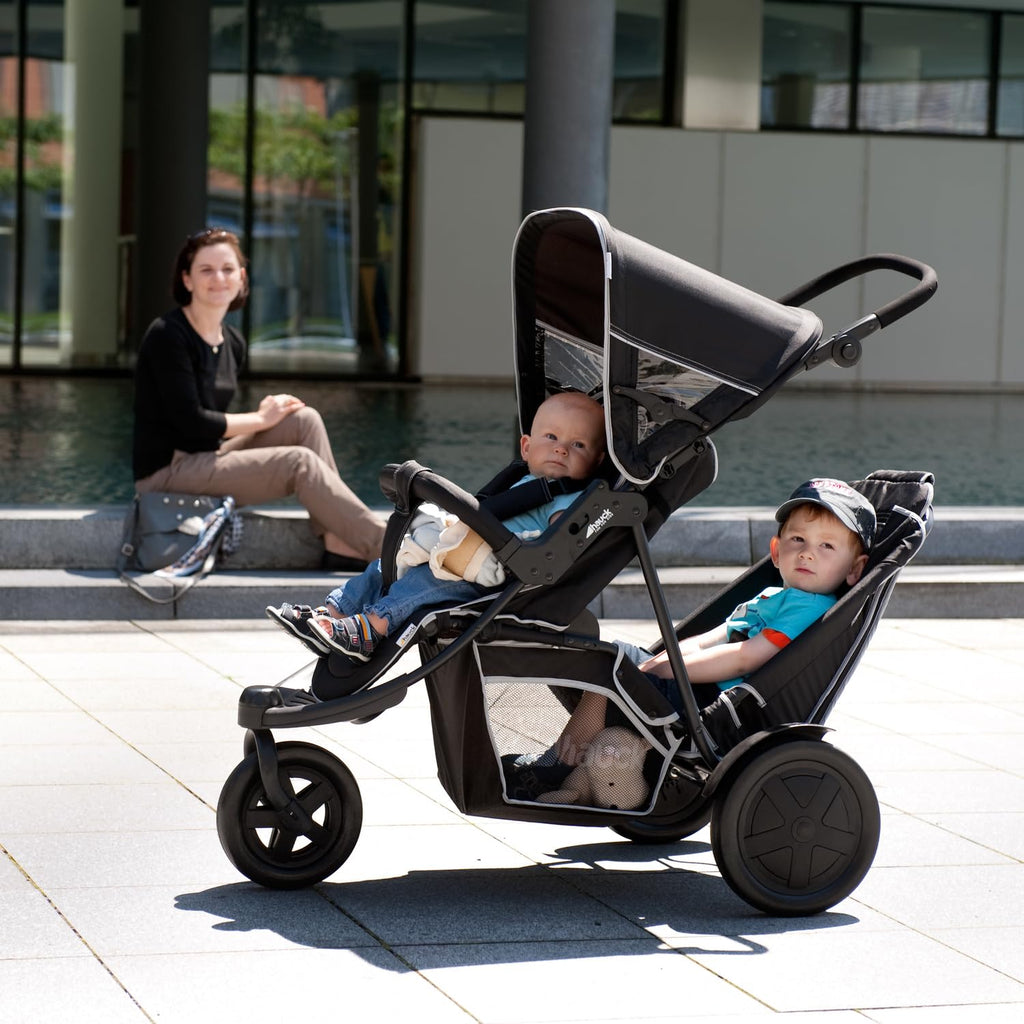 hauck Freerider, Schwarz - 3 Rad Geschwisterbuggy mit Regenschutz für 2 Kinder - Oberer Sitz mit Liegefunktion ab Geburt - Unterer Sitz ab 6 Monaten - Max. 15 Pro Sitz - Höhenverstellbar