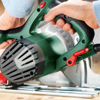 Bosch Kreissäge PKS 66 AF (Präzises Sägen in Holz, 1600 Watt; max. Schnitttiefe 66 mm; 3 tlg. Führungsschienenset)