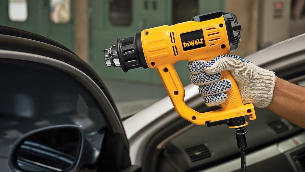 Dewalt 2.000 Watt Heißluftpistole D26414 (Temperatur 50-600°, Luftdurchsatz: 650 l/min, mit Flach- sowie Konusdüse und Lackschaber, sichere vertikale Standposition zum stationären Einsatz)