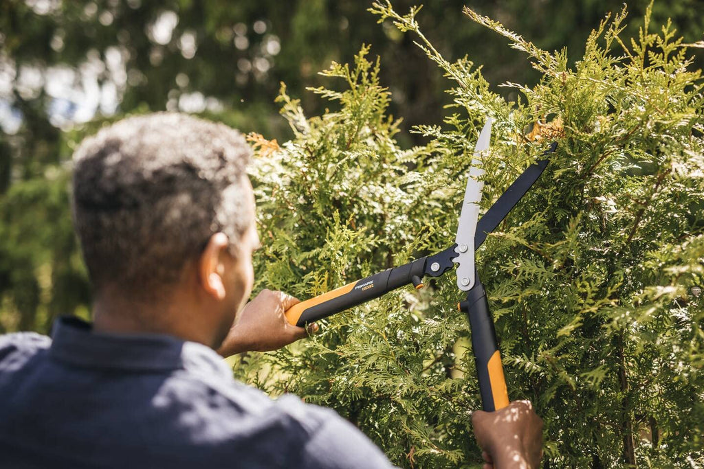 Fiskars PowerGear X Getriebe-Heckenschere, Antihaftbeschichtet, Hochwertige Stahl-Klingen, Länge: 63 cm, Schwarz/Orange, HSX92, 1023631