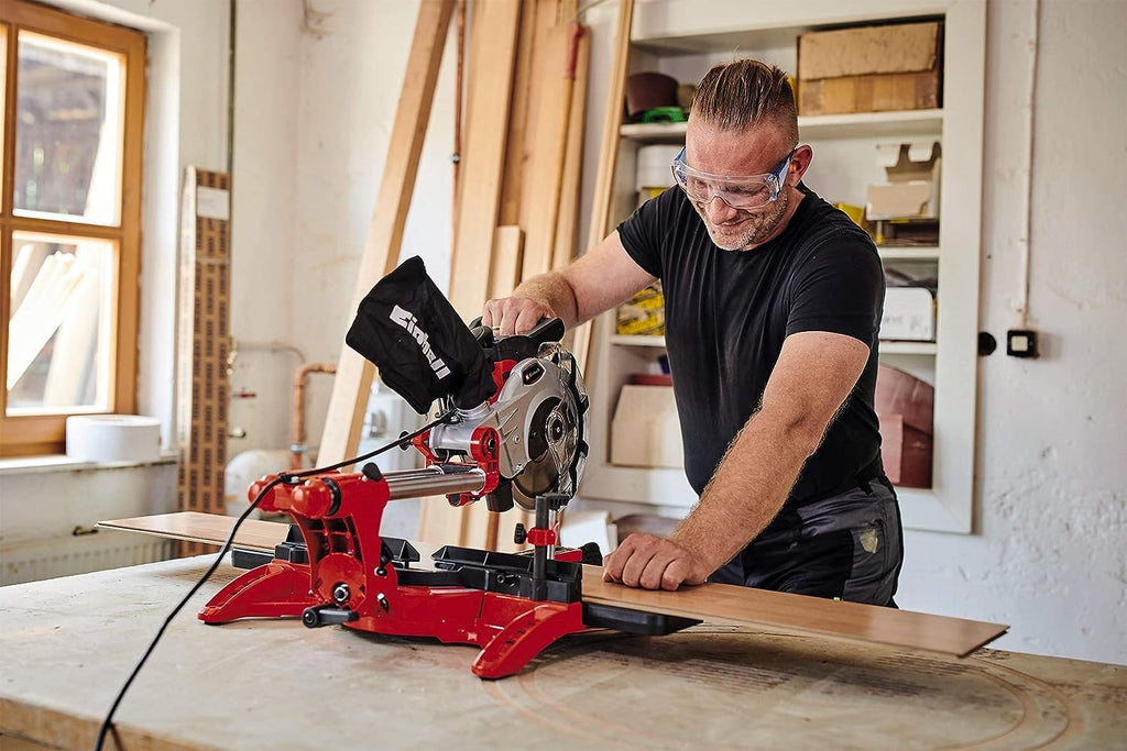 Einhell Zug-Kapp-Gehrungssäge TC-SM 2131/2 Dual (1800 W, max. 62 mm x 310 mm Schnitttiefe/-breite, Ø 210 mm Sägeblatt, beidseitig neigbarer Sägekopf, Zugfunktion, Laser)