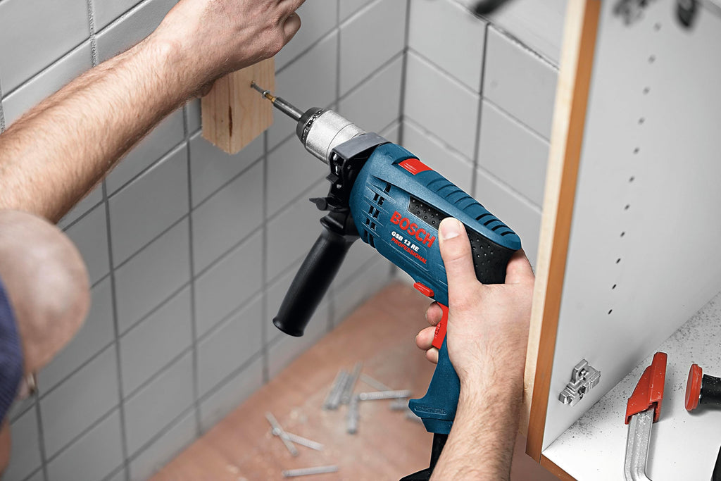 Bosch Professional Schlagbohrmaschine GSB 13 RE (Leistung 600 Watt, inkl. Tiefenanschlag 210mm, Schnellspannbohrfutter 13mm)