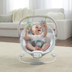 Ingenuity, Babywippe Babyschaukel Morrison mit beruhigenden Vibrationen & 8 Melodien, Spielbogen mit 2 Spielzeugen, Lautstärkeregler, gepolsterter Kopfstütze, 3-Punkte-Gurt, ab der Geburt bis 9kg