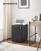 SONGMICS Rollcontainer, unter Schreibtisch, mit 3 Schublade, vormontiert, abschließbarer Büroschrank mit Hängeregistratur, für Akten, Dokumente, Schreibwaren, 52 x 39 x 60 cm, schwarz OFC60BK