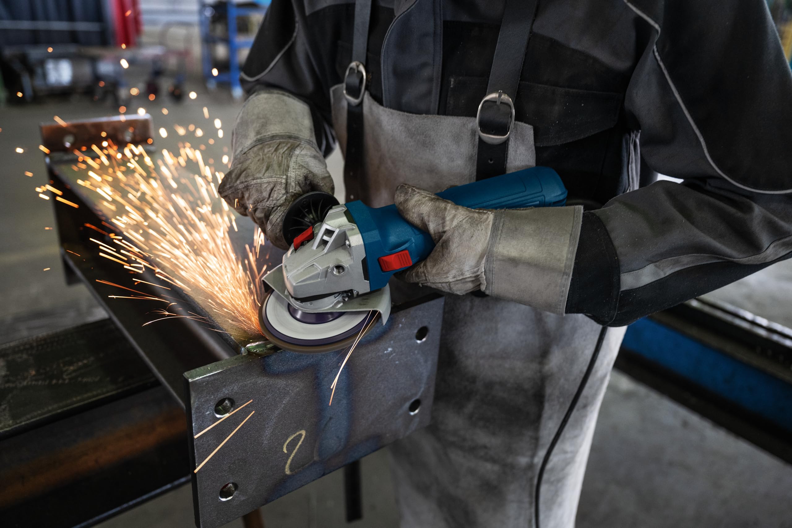 Bosch Professional Winkelschleifer GWS 12-125 (Scheiben-Ø: 125mm, Leistung 1200 W, Wiederanlaufschutz, inkl. Schutzhaube, Spannmutter, Standard-Zusatzhandgriff)