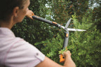 Fiskars SmartFit Teleskop-Heckenschere, Antihaftbeschichtet, Hochwertige Stahl-Klingen, Länge: 68 bis 93 cm, Schwarz/Orange, HS86, 1013565